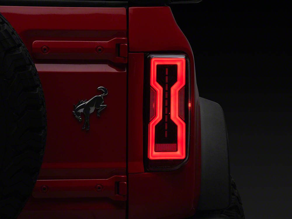 Raxiom Axial Series LED Tail Lights; Black Housing; Clear Lens (21-25 Bronco w/ Factory Halogen Tail Lights)