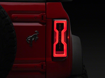 Raxiom Axial Series LED Tail Lights; Black Housing; Clear Lens (21-25 Bronco w/ Factory Halogen Tail Lights)