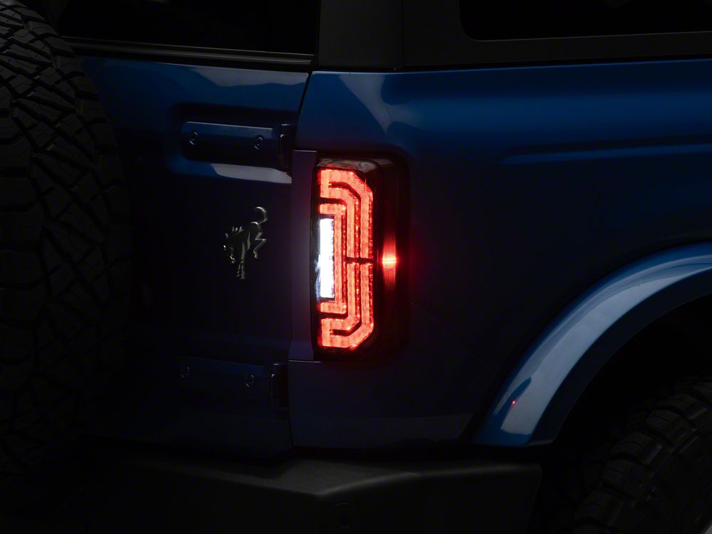Raxiom LED Tail Lights; Black Housing; Clear Lens (21-25 Bronco w/ Factory Halogen Tail Lights)