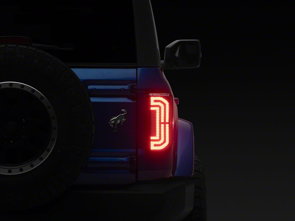 Raxiom LED Tail Lights; Black Housing; Clear Lens (21-25 Bronco w/ Factory Halogen Tail Lights)
