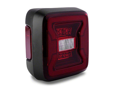 Raxiom LED Tail Lights; Black Housing; Red Lens (18-25 Jeep Wrangler JL w/ Factory Halogen Tail Lights & w/o Blind Spot Detection)