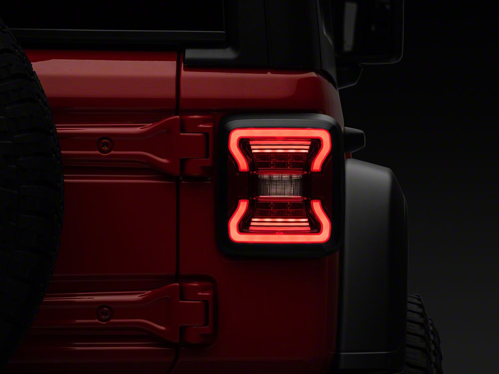 Raxiom LED Tail Lights; Black Housing; Red Lens (18-25 Jeep Wrangler JL w/ Factory Halogen Tail Lights & w/o Blind Spot Detection)