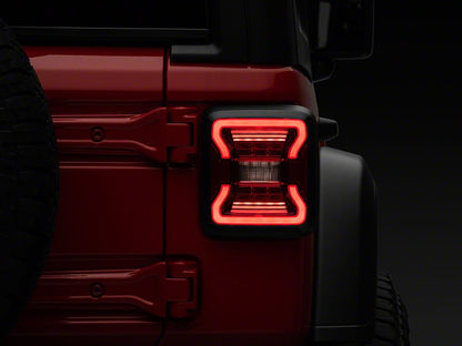Raxiom LED Tail Lights; Black Housing; Red Lens (18-25 Jeep Wrangler JL w/ Factory Halogen Tail Lights & w/o Blind Spot Detection)