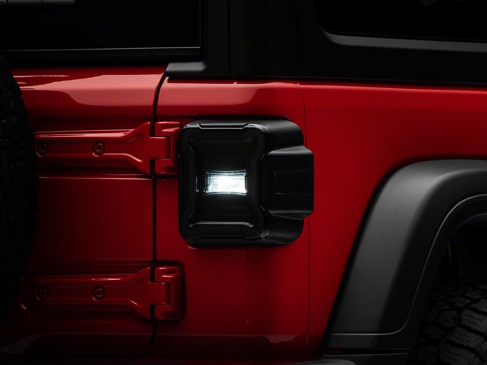 Raxiom LED Tail Lights; Black Housing; Smoked Lens (18-25 Jeep Wrangler JL w/ Factory Halogen Tail Lights & w/o Blind Spot Detection)