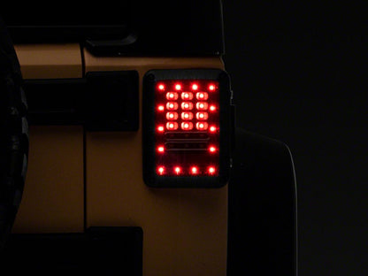 Raxiom Axial Series LED Tail Lights; Black Housing; Clear Lens (07-18 Jeep Wrangler JK)