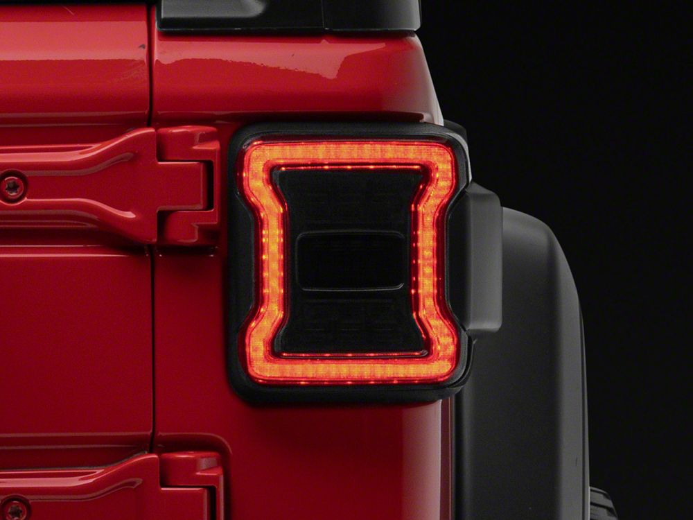 Raxiom LED Tail Lights; Red Housing; Smoked Lens (18-25 Jeep Wrangler JL w/ Factory Halogen Tail Lights & w/o Blind Spot Detection)