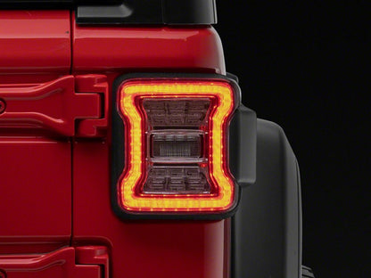 Raxiom LED Tail Lights; Clear Housing; Clear Lens (18-25 Jeep Wrangler JL w/ Factory Halogen Tail Lights & w/o Blind Spot Detection)