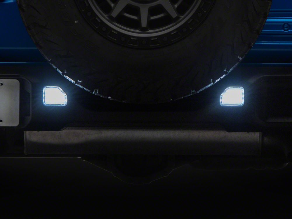 Raxiom Clear LED Rear Bumper Reflector Lights; White LED (18-26 Jeep Wrangler JL)