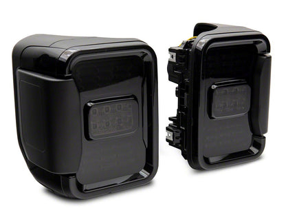 Raxiom LED Tail Lights; Black Housing; Smoked Lens (20-25 Jeep Gladiator JT w/ Factory Halogen Tail Lights & w/o Blind Spot Detection))