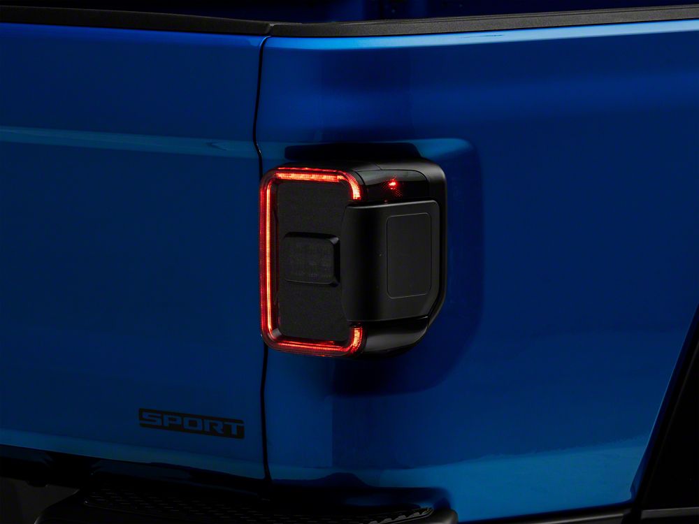 Raxiom Axial Series LED Tail Lights; Black Housing; Smoked Lens (20-25 Jeep Gladiator JT w/ Factory Halogen Tail Lights & w/o Blind Spot Detection))