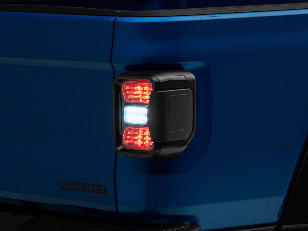 Raxiom Axial Series LED Tail Lights; Black Housing; Smoked Lens (20-25 Jeep Gladiator JT w/ Factory Halogen Tail Lights & w/o Blind Spot Detection))
