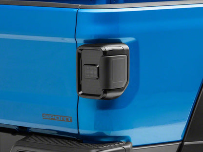 Raxiom Axial Series LED Tail Lights; Black Housing; Smoked Lens (20-25 Jeep Gladiator JT w/ Factory Halogen Tail Lights & w/o Blind Spot Detection))