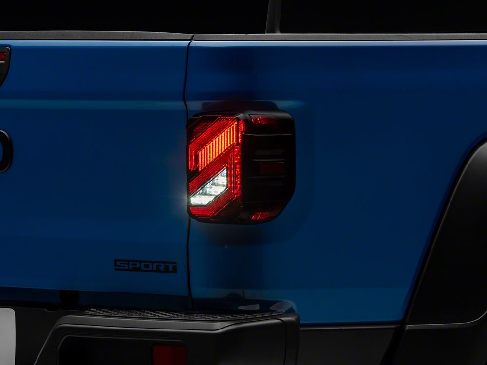 Raxiom Axial Series LED Tail Lights; Black Housing; Smoked Lens (20-25 Jeep Gladiator JT w/ Factory Halogen Tail Lights & w/o Blind Spot Detection))