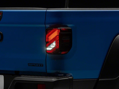 Raxiom Axial Series LED Tail Lights; Black Housing; Smoked Lens (20-25 Jeep Gladiator JT w/ Factory Halogen Tail Lights & w/o Blind Spot Detection))