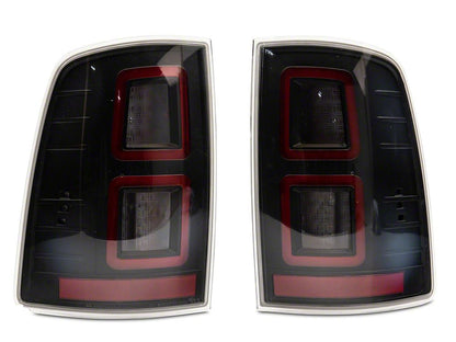 Raxiom LED Tail Lights; Black Housing; Clear Lens (09-18 RAM 1500 w/ Factory Halogen Tail Lights)
