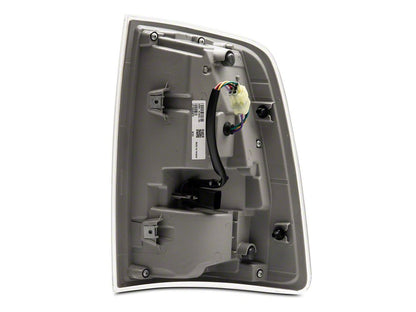 Raxiom LED Tail Lights; Black Housing; Clear Lens (09-18 RAM 1500 w/ Factory Halogen Tail Lights)