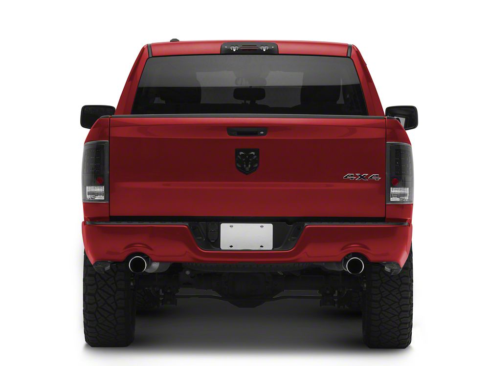 Raxiom LED Tail Lights; Black Housing; Clear Lens (09-18 RAM 1500 w/ Factory Halogen Tail Lights)