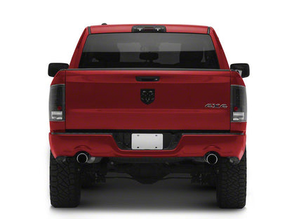 Raxiom LED Tail Lights; Black Housing; Clear Lens (09-18 RAM 1500 w/ Factory Halogen Tail Lights)