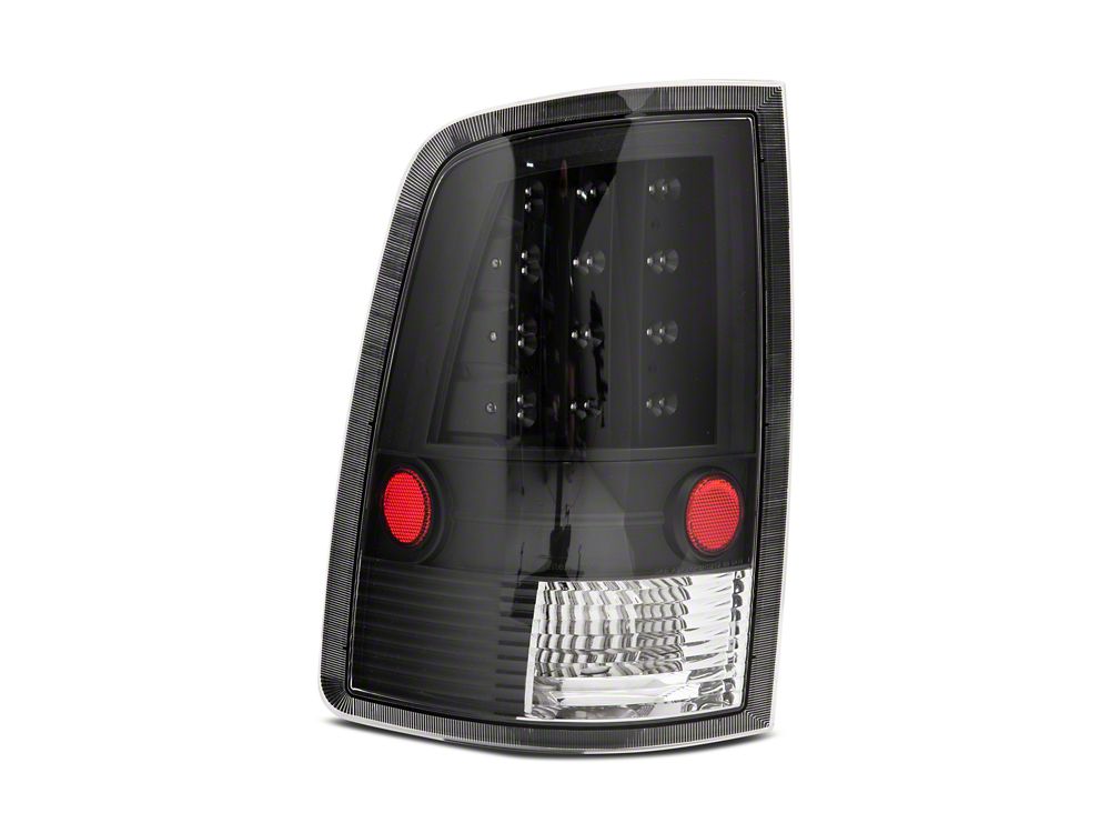 Raxiom LED Tail Lights; Black Housing; Clear Lens (09-18 RAM 1500 w/ Factory Halogen Tail Lights)