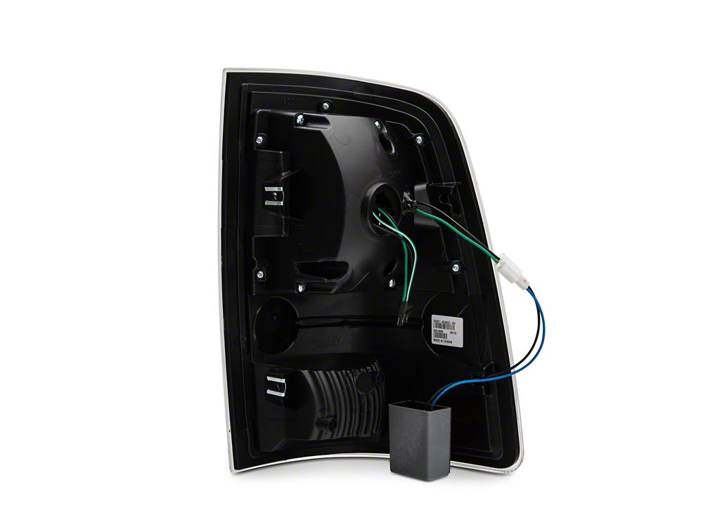 Raxiom LED Tail Lights; Black Housing; Clear Lens (09-18 RAM 1500 w/ Factory Halogen Tail Lights)