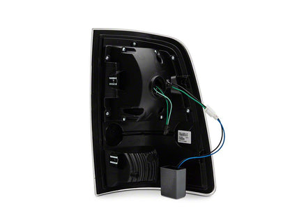 Raxiom LED Tail Lights; Black Housing; Clear Lens (09-18 RAM 1500 w/ Factory Halogen Tail Lights)