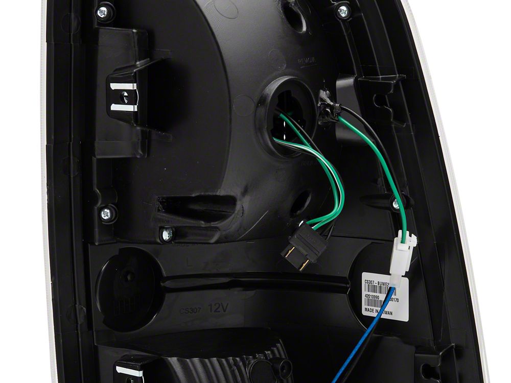 Raxiom LED Tail Lights; Black Housing; Clear Lens (09-18 RAM 1500 w/ Factory Halogen Tail Lights)