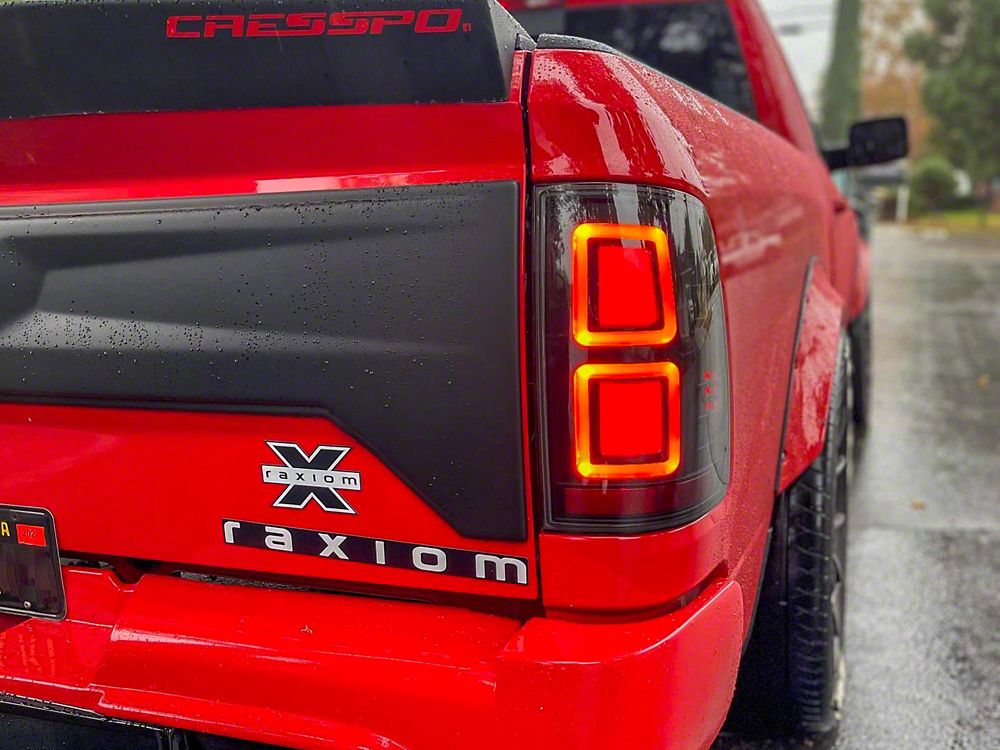 Raxiom LED Tail Lights; Black Housing; Light Smoked Lens (09-18 RAM 1500 w/ Factory Halogen Tail Lights)