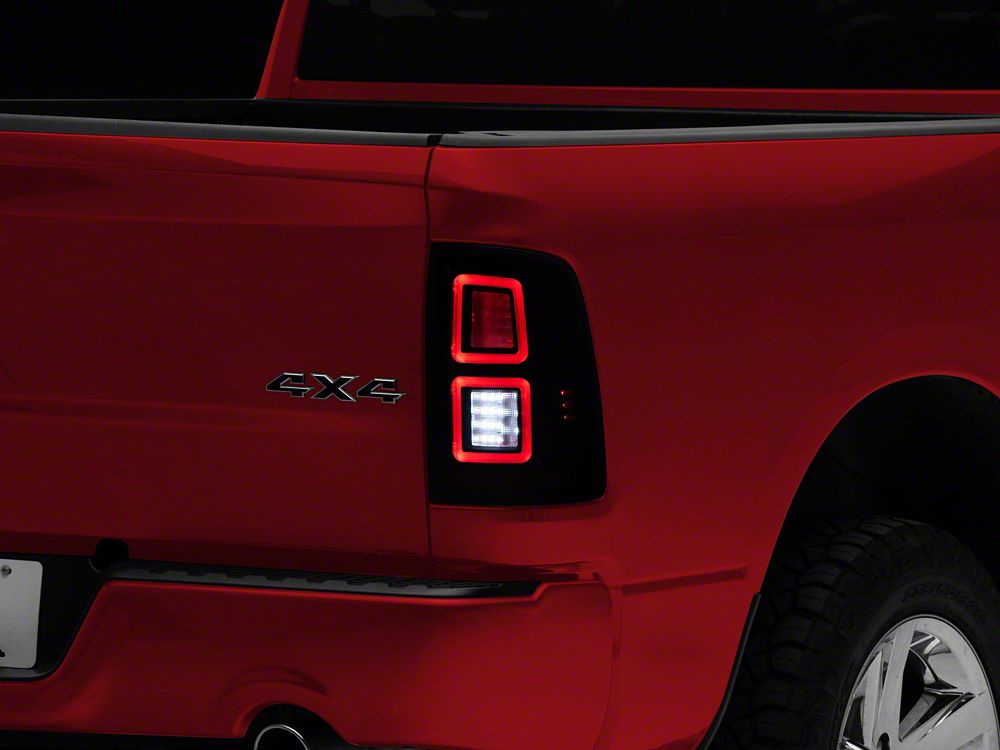 Raxiom LED Tail Lights; Black Housing; Light Smoked Lens (09-18 RAM 1500 w/ Factory Halogen Tail Lights)