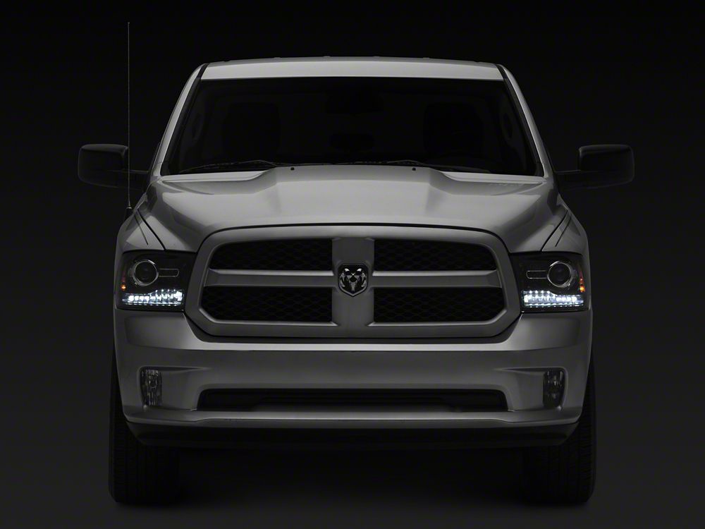 Raxiom LED Halo Headlights with Switchback Turn Signals; Black Housing; Clear Lens (09-18 RAM 1500 w/ Factory Halogen Non-Projector Headlights)