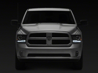 Raxiom LED Halo Headlights with Switchback Turn Signals; Black Housing; Clear Lens (09-18 RAM 1500 w/ Factory Halogen Non-Projector Headlights)