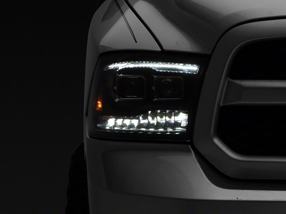 Raxiom LED Projector Headlights with Switchback Turn Signals; Black Housing; Clear Lens (09-18 RAM 1500 w/ Factory Halogen Non-Projector Headlights)
