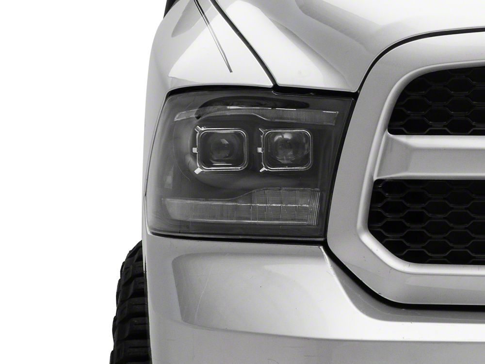 Raxiom LED Projector Headlights with Switchback Turn Signals; Black Housing; Clear Lens (09-18 RAM 1500 w/ Factory Halogen Non-Projector Headlights)