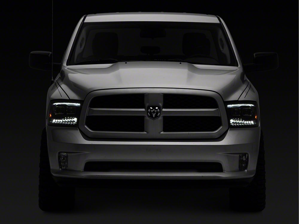 Raxiom LED Projector Headlights with Switchback Turn Signals; Black Housing; Clear Lens (09-18 RAM 1500 w/ Factory Halogen Non-Projector Headlights)