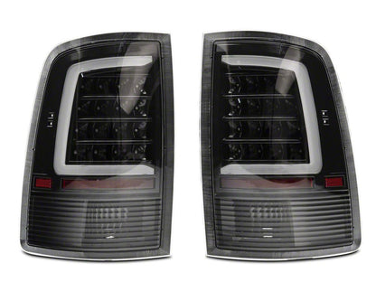 Raxiom Axial Series LED Tail Lights; Black Housing; Clear Lens (09-18 RAM 1500 w/ Factory Halogen Tail Lights)