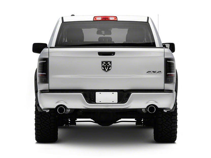 Raxiom Axial Series LED Tail Lights; Black Housing; Clear Lens (09-18 RAM 1500 w/ Factory Halogen Tail Lights)