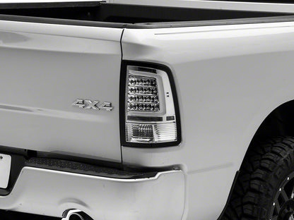Raxiom Axial Series LED Tail Lights; Chrome Housing; Clear Lens (09-18 RAM 1500 w/ Factory Halogen Tail Lights)