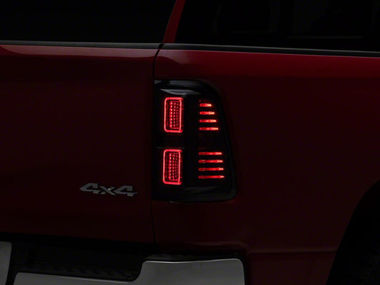 Raxiom CXR Series LED Tail Lights; Black Housing; Smoked Lens (19-24 RAM 1500 w/ Factory Halogen Tail Lights)