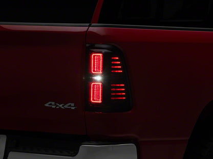 Raxiom CXR Series LED Tail Lights; Black Housing; Smoked Lens (19-24 RAM 1500 w/ Factory Halogen Tail Lights)