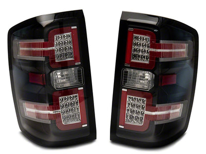 Raxiom LED Tail Lights with Sequential Turn Signals; Black Housing; Clear Lens (14-18 Silverado 1500 w/ Factory Halogen Tail Lights)