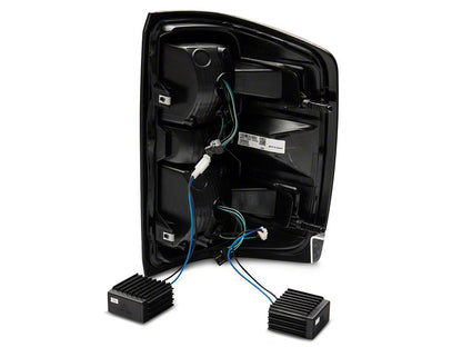 Raxiom LED Tail Lights with Sequential Turn Signals; Black Housing; Clear Lens (14-18 Silverado 1500 w/ Factory Halogen Tail Lights)