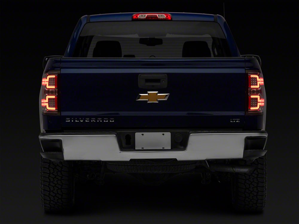 Raxiom LED Tail Lights with Sequential Turn Signals; Chrome Housing; Clear Lens (14-18 Silverado 1500 w/ Factory Halogen Tail Lights)