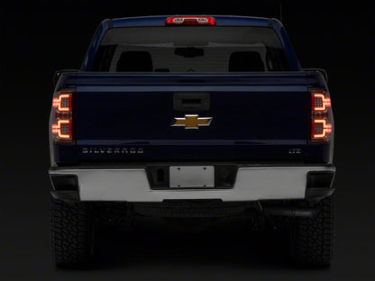 Raxiom LED Tail Lights with Sequential Turn Signals; Chrome Housing; Clear Lens (14-18 Silverado 1500 w/ Factory Halogen Tail Lights)
