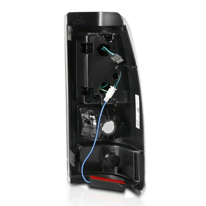 Raxiom Axial Series LED Tail Lights; Black Housing; Clear Lens (03-06 Silverado 1500 Fleetside)