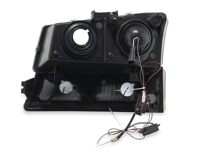 Raxiom LED Light Bar OE Style Projector Headlights with Bumper Lights; Black Housing; Clear Lens (03-06 Silverado 1500)