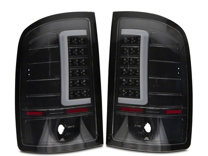 Raxiom Axial Series C-Tube LED Tail Lights; Black Housing; Clear Lens (07-13 Sierra 1500)