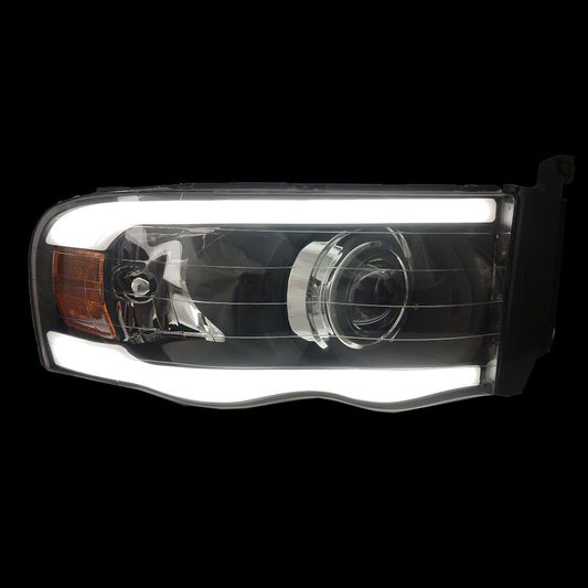 Raxiom Axial Series Projector Headlights with LED Bar; Black Housing; Clear Lens (03-05 RAM 3500)