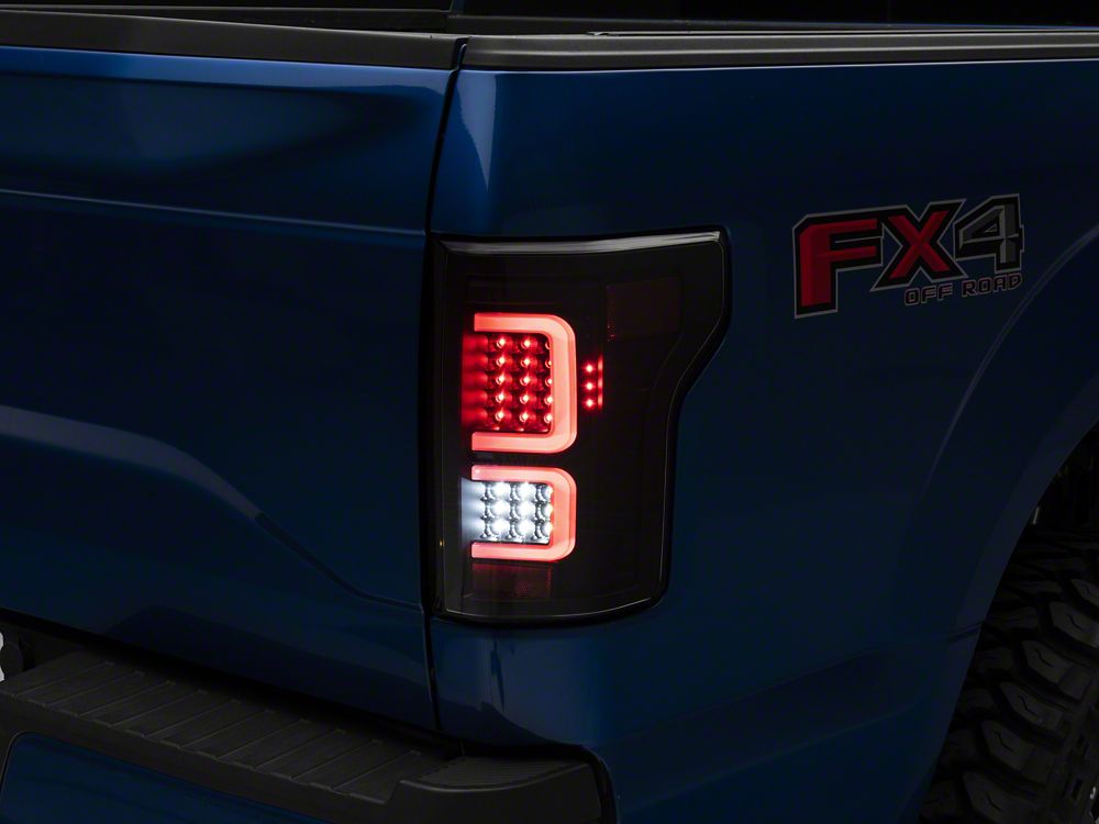Raxiom G3 LED Tail Lights; Black Housing; Clear Lens (15-17 F-150 w/ Factory Halogen Non-BLIS Tail Lights)