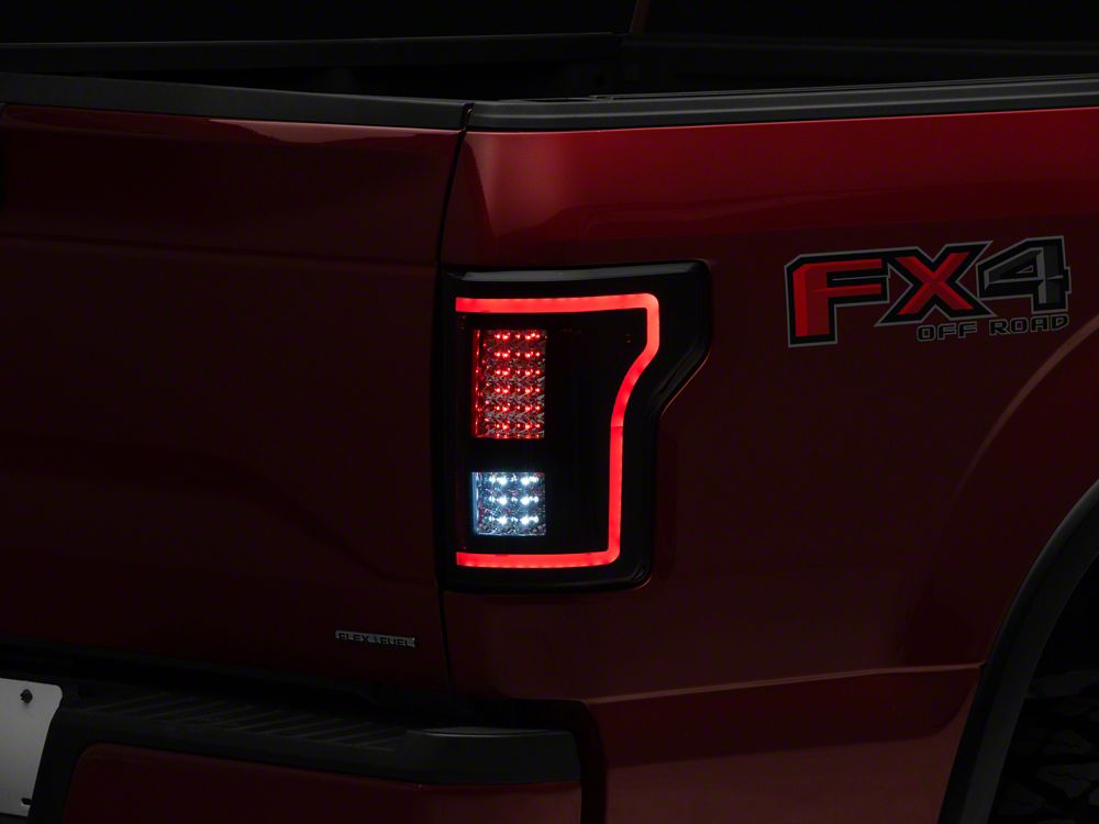 Raxiom LED Tail Lights with Sequential Turn Signals; Black Housing; Smoked Lens (15-17 F-150 w/ Factory Halogen Non-BLIS Tail Lights)
