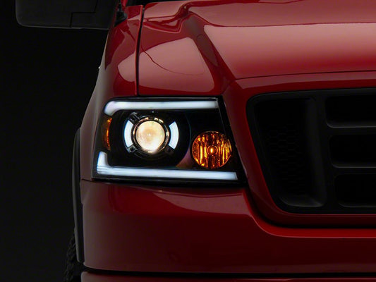 Raxiom Axial Series Projector Headlights with Sequential LED Bar; Black Housing; Clear Lens (04-08 F-150)