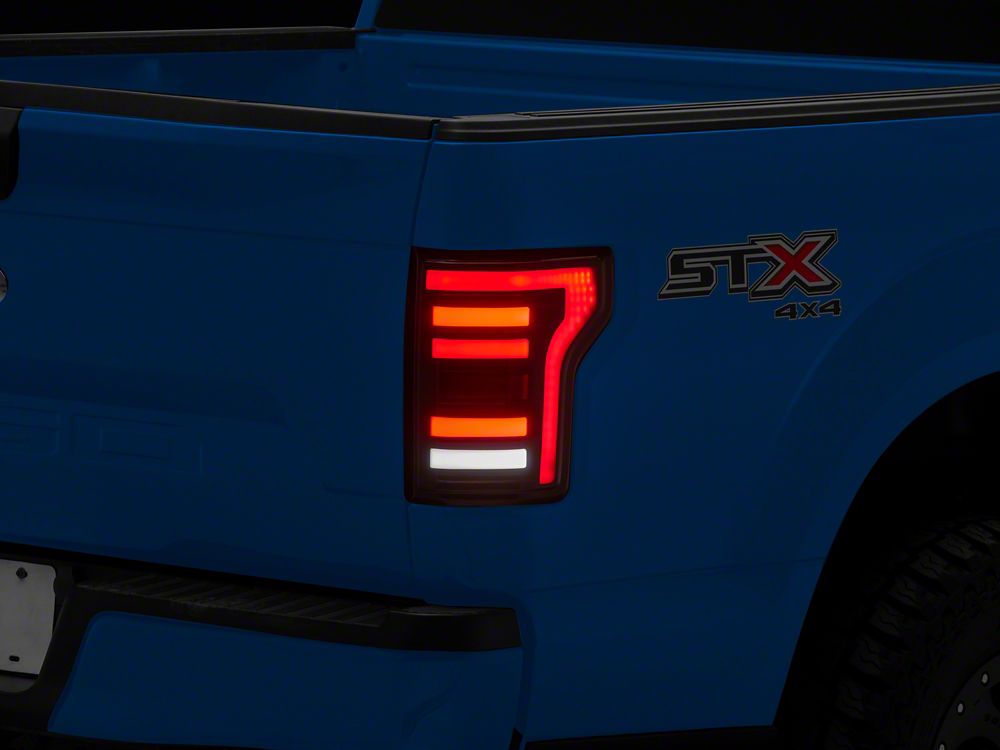 Raxiom RBX LED Tail Lights; Black Housing; Smoked Lens (15-20 F-150 w/ Factory Halogen Tail Lights)